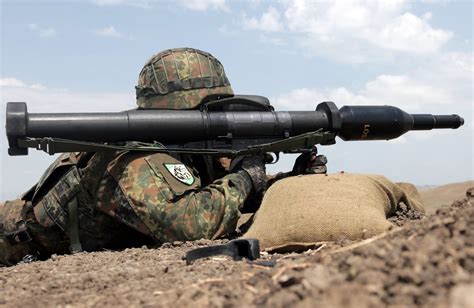 Infantryman firing a light anti-tank weapon