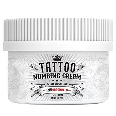 Applying tattoo cream numbing relief