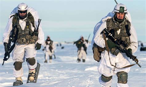 Soldiers participating in the Arctic Defender Exercise in cold weather conditions