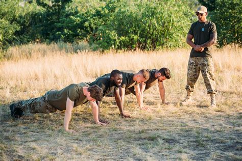 Recruits engaging in combat training exercise