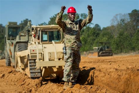 Army construction engineers working on a building site