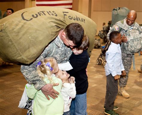 Army soldiers with their families