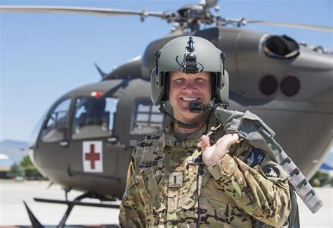 Army helicopter pilot in flight