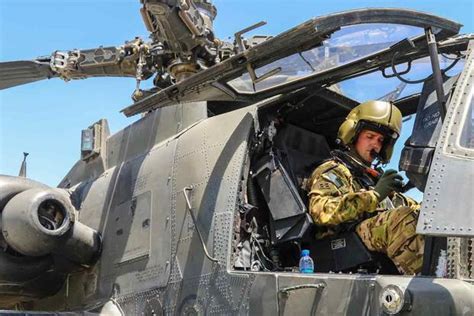 Army helicopter pilot in flight