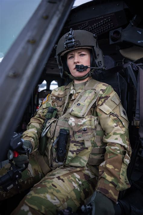 Army helicopter pilot in flight