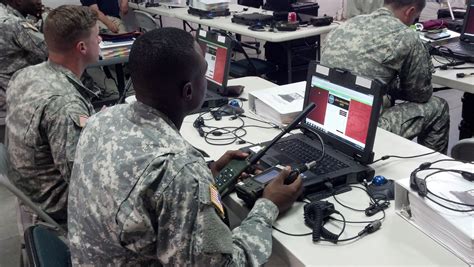 Army IT Specialist working on a computer