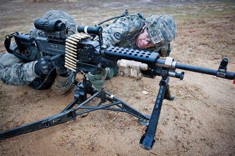 Army Machine Gunner in Action