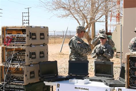 Army Network Switching Systems Operator-Maintainer working on a network switch