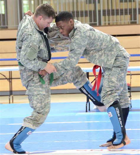 Army soldiers running obstacle course