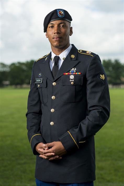 A photo of an Army Reserve soldier wearing insignia and badges