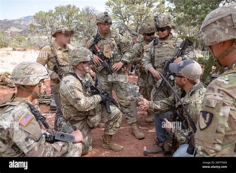 Army Special Forces operators conducting unconventional warfare