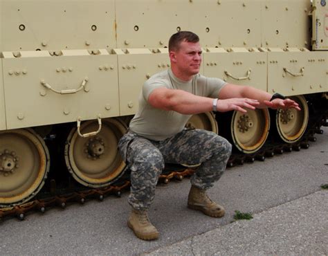 Army soldier doing squats