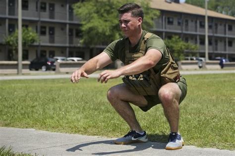 Army soldier doing squats