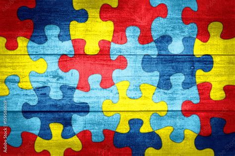 Autism Awareness Puzzle Piece with Rainbow Colors