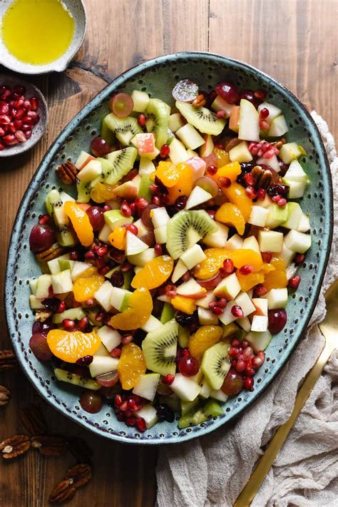 Autumn fruit bowl with apples, pears, and cranberries