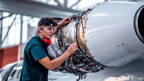 Aviation Mechanic Inspecting Aircraft