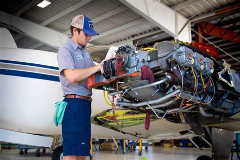 Aviation Mechanic Repairing Engine