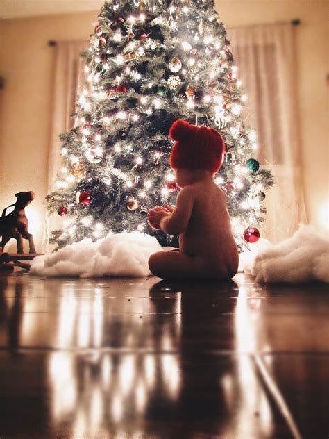 Newborn baby inside a Christmas tree