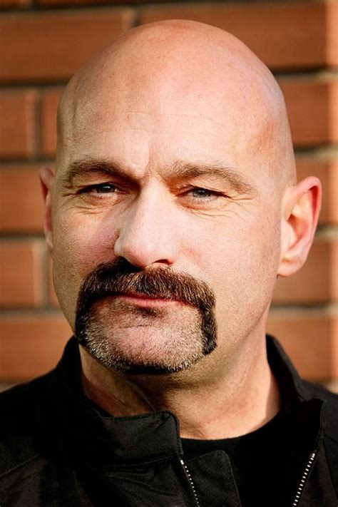 Bald head with different mustache styles