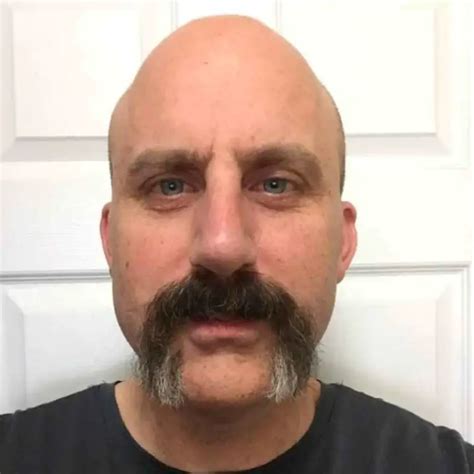 Bald head with mustache style