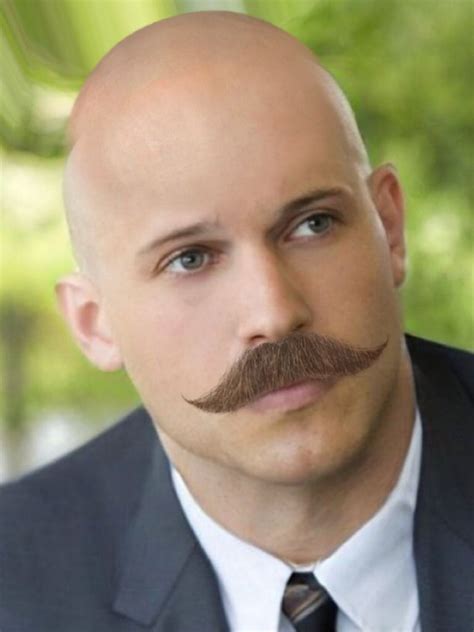 Bald head with mustache