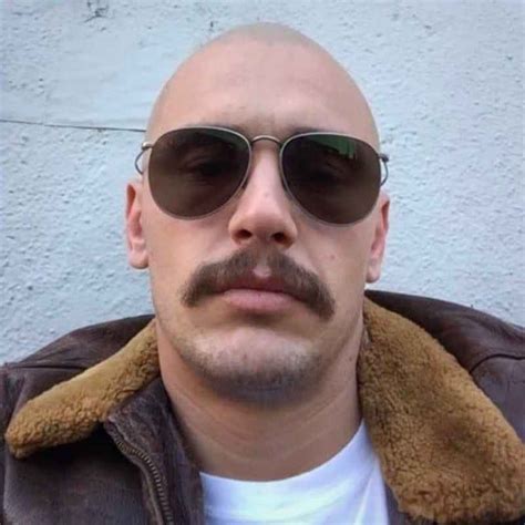 Bald head with mustache