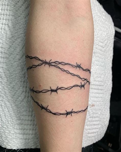 Description of Barbed Wire Arm Tattoo Design