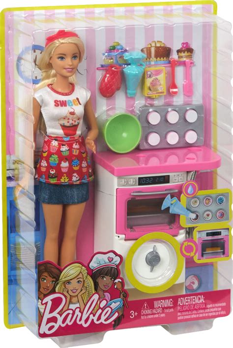 A miniature bakery setup with Barbie dolls