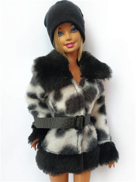 Barbie wearing a cozy winter coat