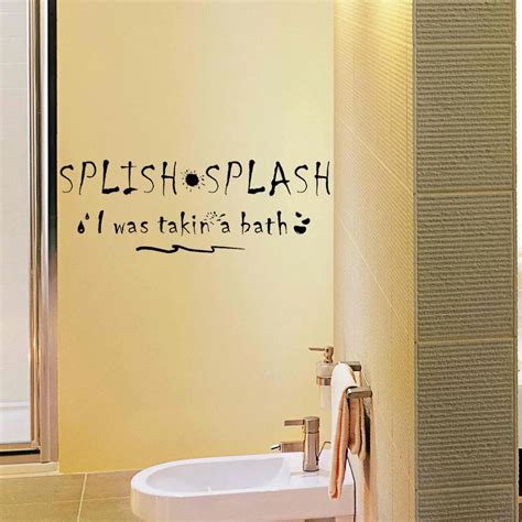 A decal with a quote applied to a bathroom wall