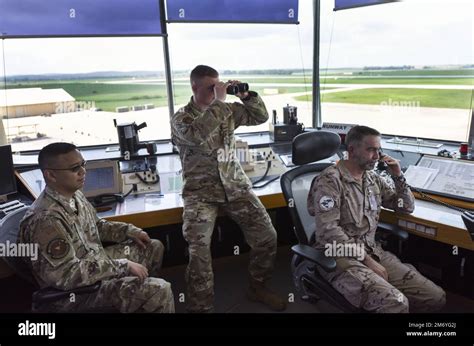 Bi-lingual air traffic controllers in a control tower