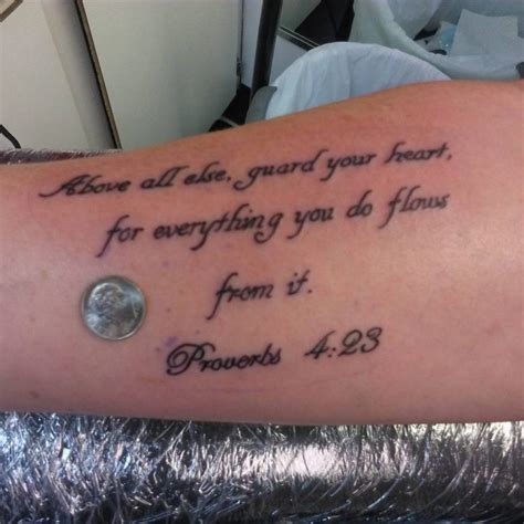 Bible verse tattoos on the arm