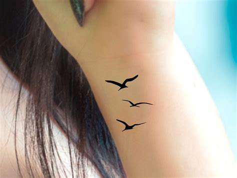 Bird in flight tattoo