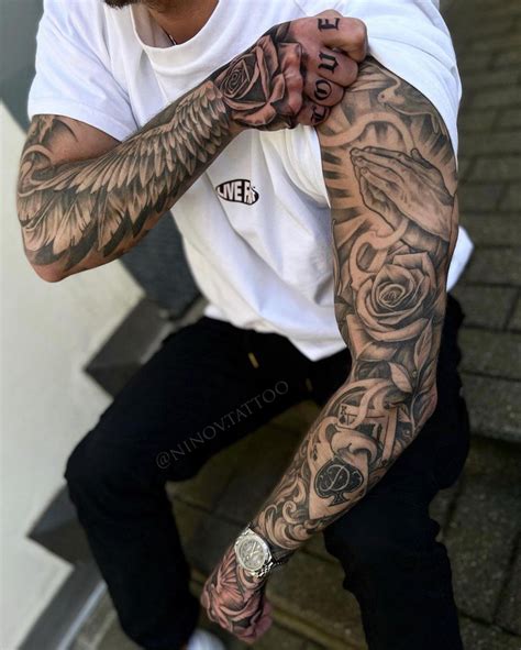 Black and gray forearm sleeve tattoo