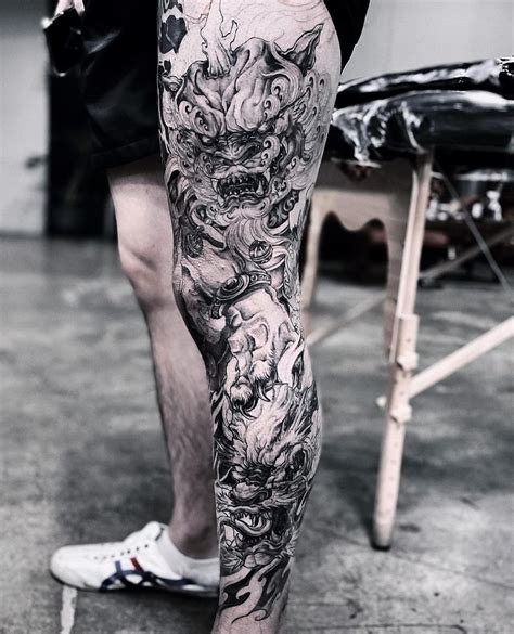 Black and Gray Leg Tattoos