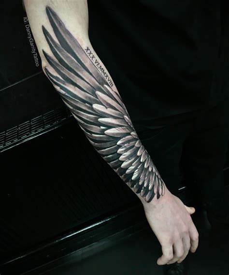 Black and Gray Wing Tattoos