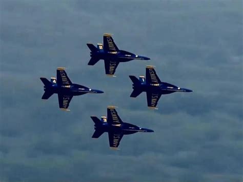 Blue Angels F/A-18 Hornet with smoke trails