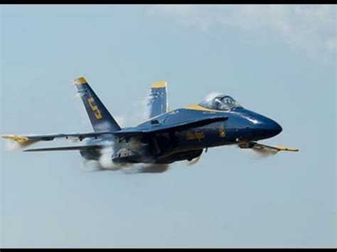 Blue Angels performing a split S