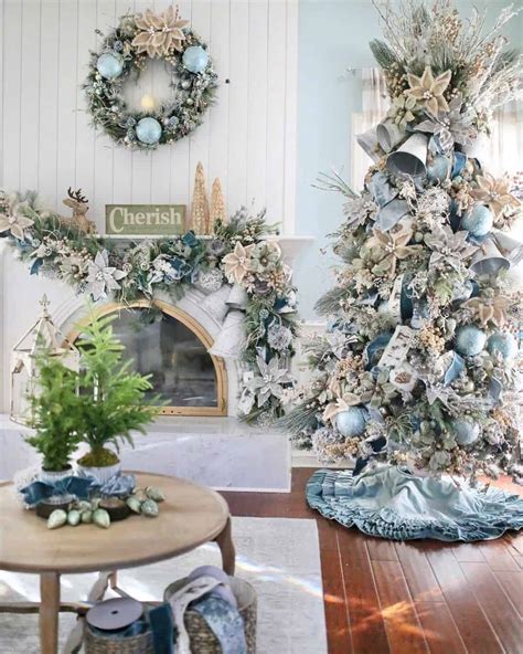 A blue Christmas tree decorated with seashells and coastal-themed ornaments