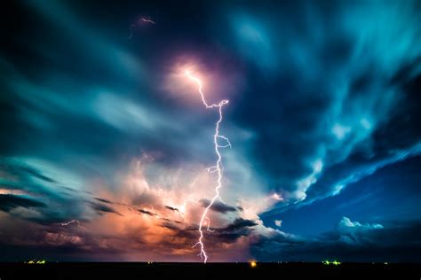 A bolt of lightning illuminating a dark sky