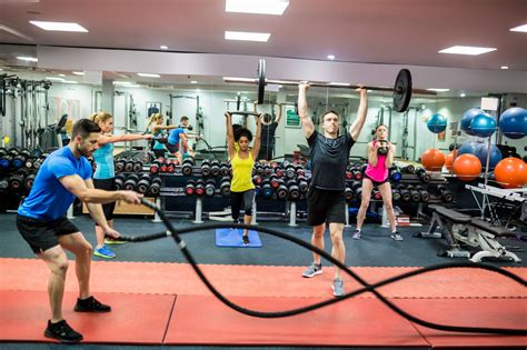 Boot camp participants exercising indoors