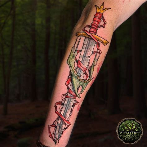 Broken sword tattoo art