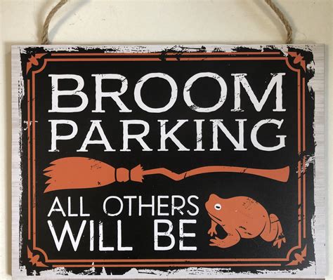 Unique Broom Parking Sign