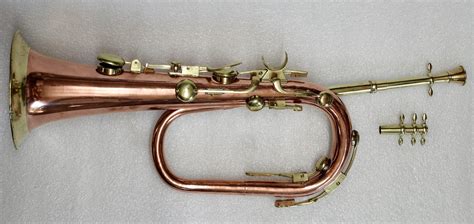 Bugle player with a backdrop of the American flag