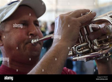 A bugle player performing on stage