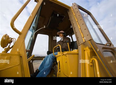 Bulldozer operator working on a construction site