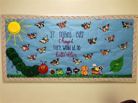 A creative bulletin board display with letters and student artwork