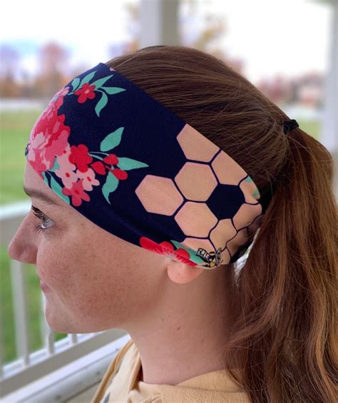 A person wearing a busy bee headband