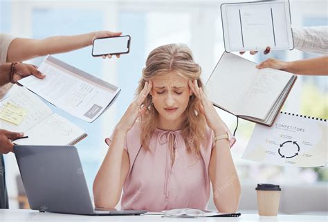 A busy and stressful office environment with people working at their desks