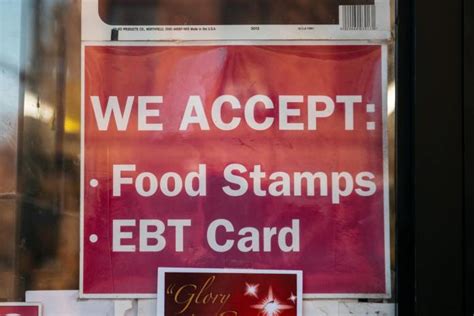 Image of a person buying food stamps